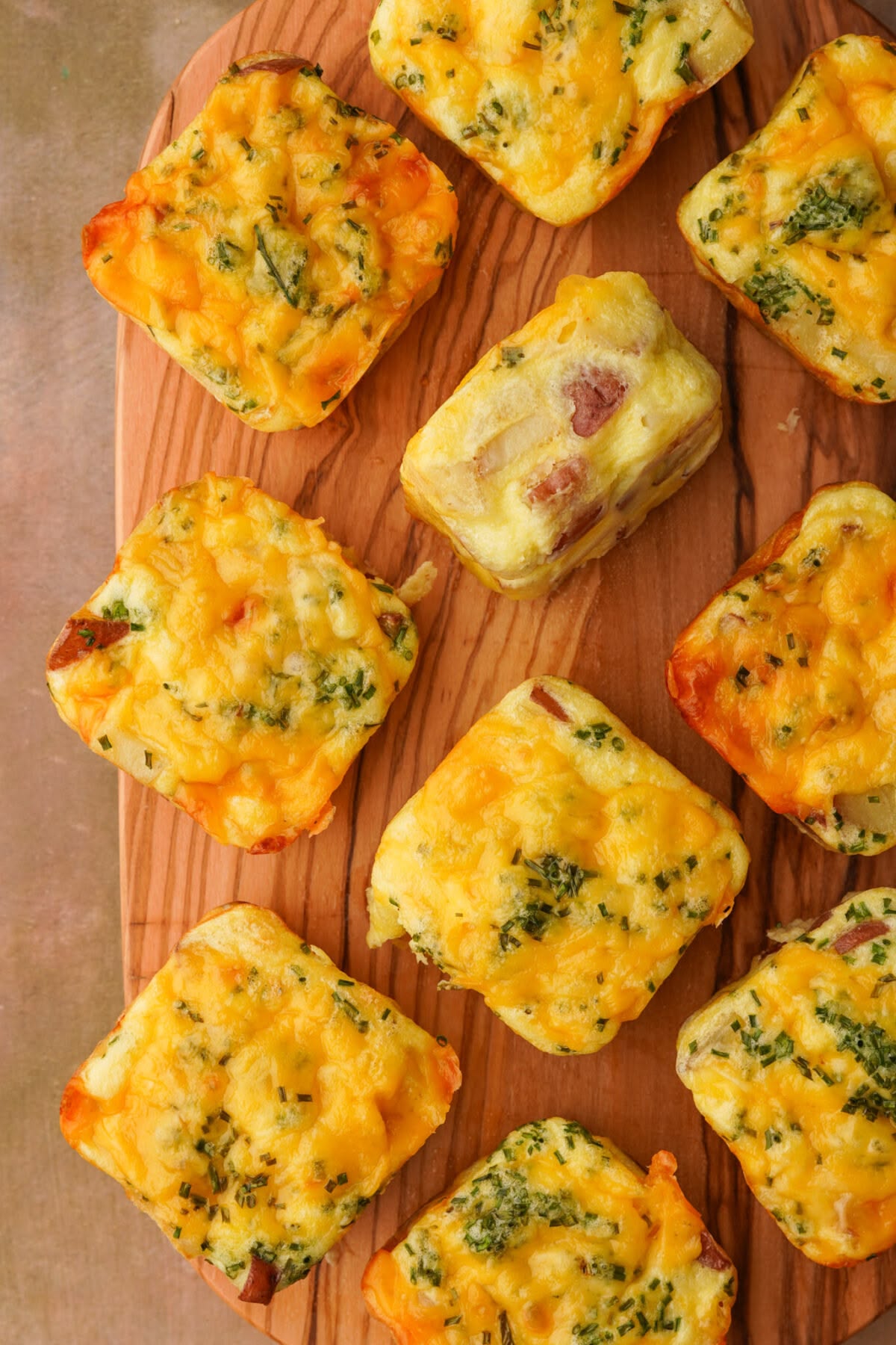 Mixed Cottage Cheese Egg Bites • 48g Protein • Fluffy cottage cheese egg bites, half spinach & Parmesan, half sun-dried tomato & mozzarella.