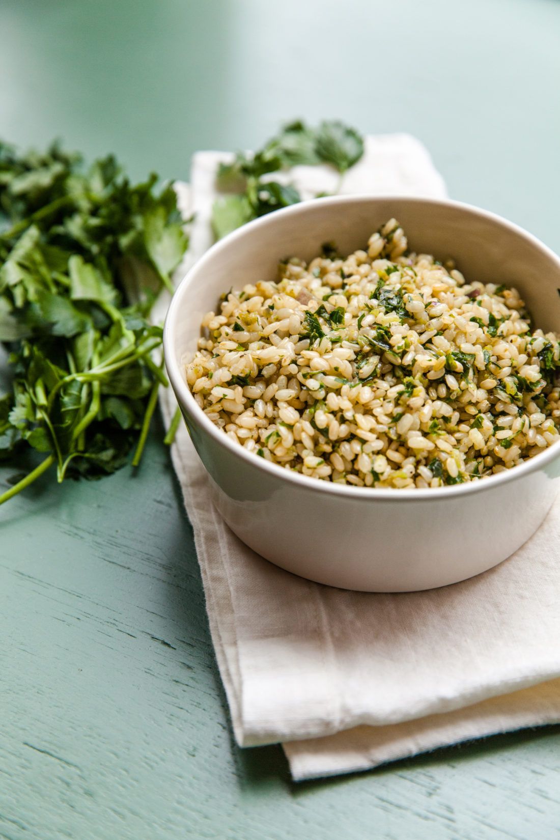 Chive Brown Rice — Brown rice tossed with chives and garlic, finished with a touch of olive oil.
