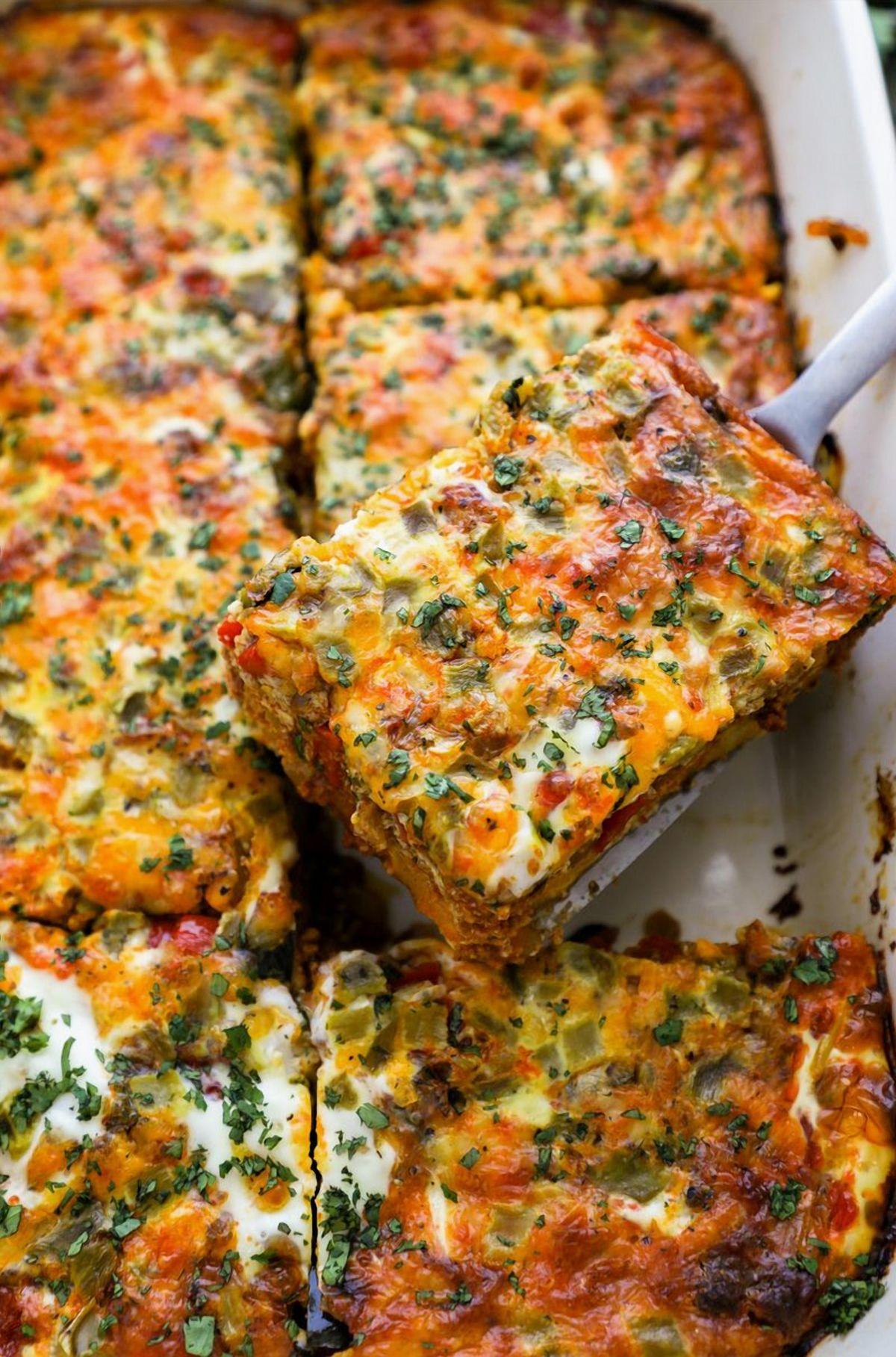 Sausage Cheddar Spinach Egg Bites (48g protein)— Egg bites with sausage, cheddar, and spinach.