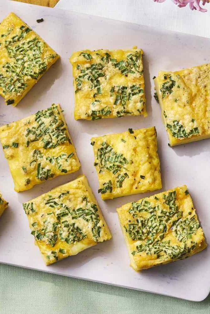 Sausage, Cheddar & Chive Egg Bites:  48g Protein Fluffy baked egg bites with savory sausage, sharp cheddar, and fresh chives.