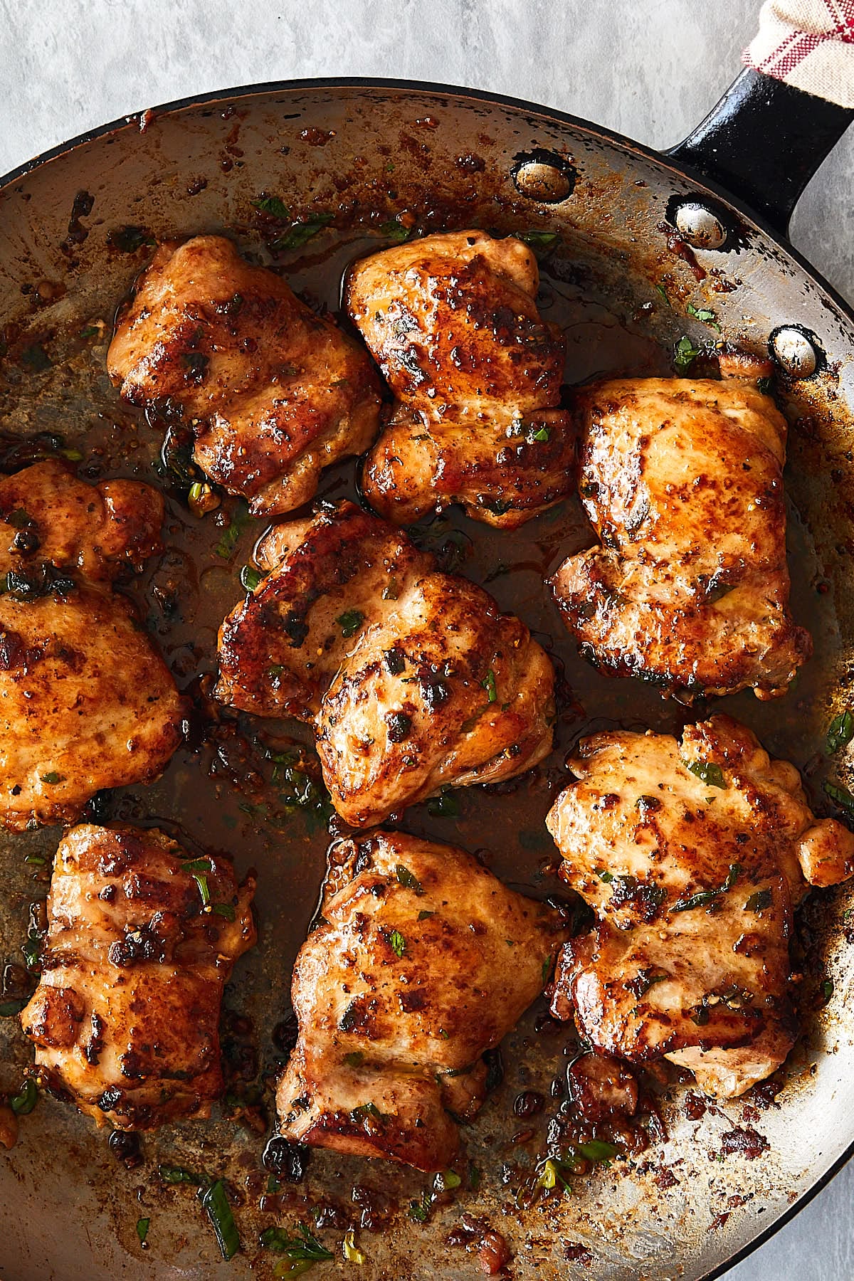 Peri Peri Chicken Shawarma — Skinless chicken thighs marinated in warm shawarma spice, roasted until charred at the edges.