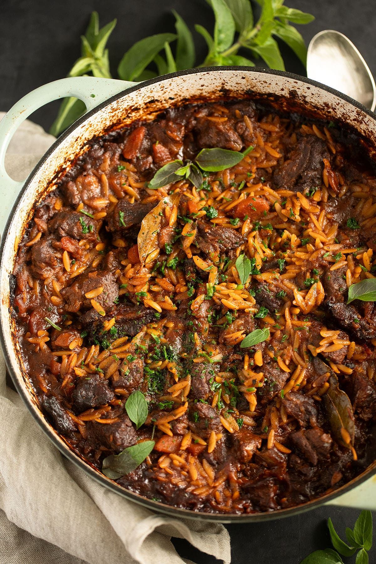 Greek-Style Beef & Orzo (GF) — Beef braised in a spiced tomato sauce with olive oil, tossed with orzo.